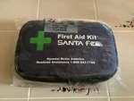 Hyundai Santa Fe First Aid Kit Part 00264-71000 Dark Blue. Fixed Price $15.99.