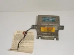 Military Surplus Champion 305035-2 Low Voltage Ignition Coil Needs Repair. Fixed Price $79.99.