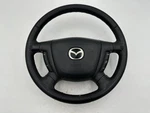2001 Mazda Tribute Driver Steering Wheel Oem 1018145-1. Fixed Price $200.00.