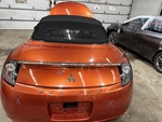 07-12 Mitsubishi Eclipse Rear Trunk Decklid Lift Gate Sunset Pearlescent M03. Fixed Price $200.00.