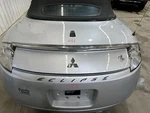 07-12 Mitsubishi Eclipse Conv Rear Trunk Decklid Lift Gate Liquid Silver A33. Fixed Price $200.00.