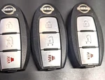 Lot Of 3 Oem Nissan Smart Key Fob Remotes KR5TXN1 Buttons. Fixed Price $45.00.